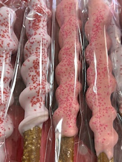 Caramel wrapped dipped pretzel rods (starts at 1 doz)
